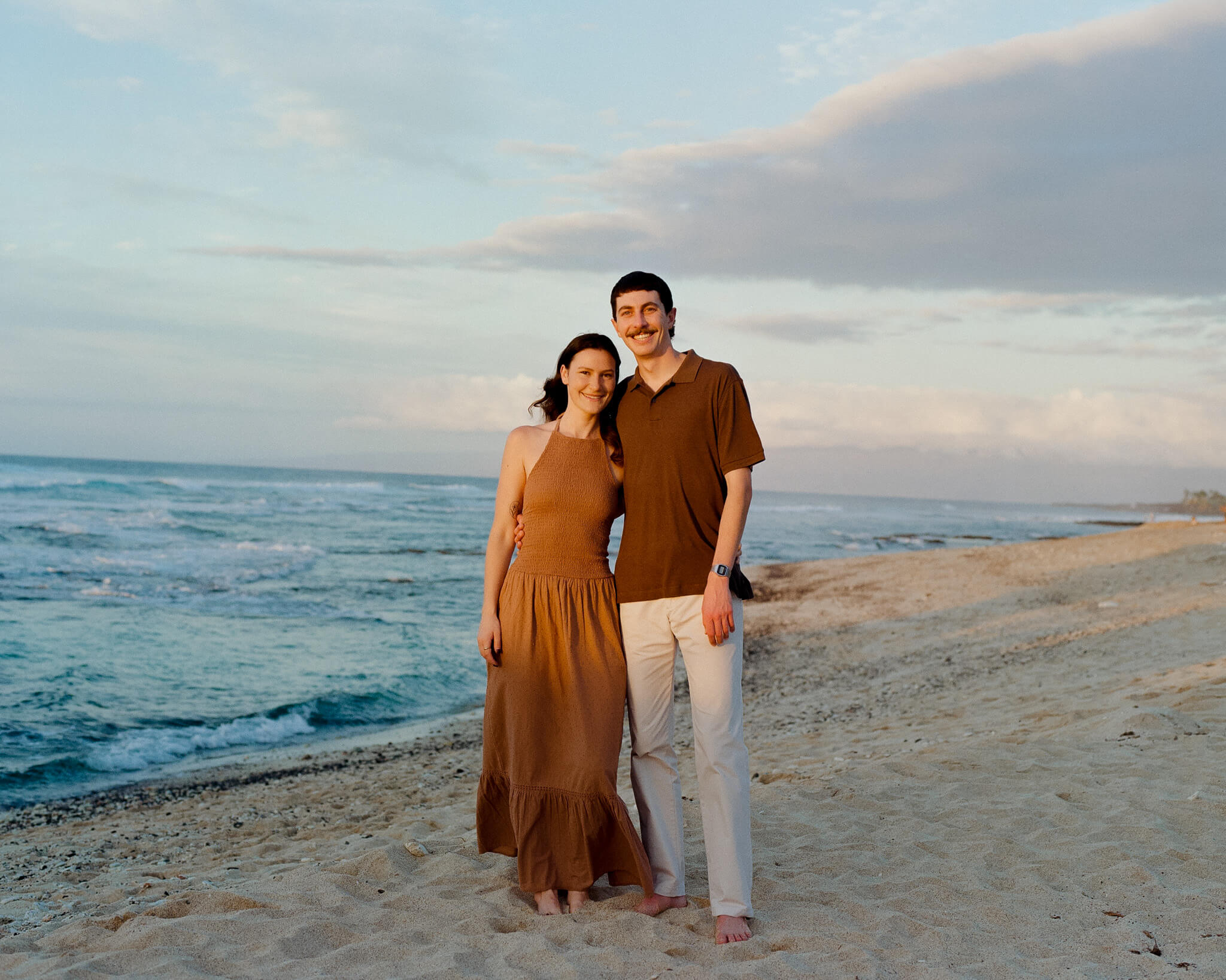 Sunset family photographer in Kona Hawaii capturing parents on film