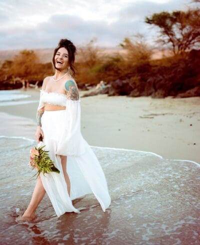 The Mathis wedding at Mau'umae Beach in Kona, Hawaii, captured by Sterling Batson, wedding photographer